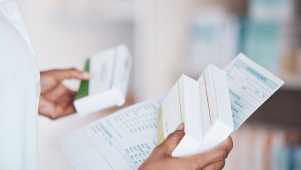 Patient preparing medical records before an OPD consultation